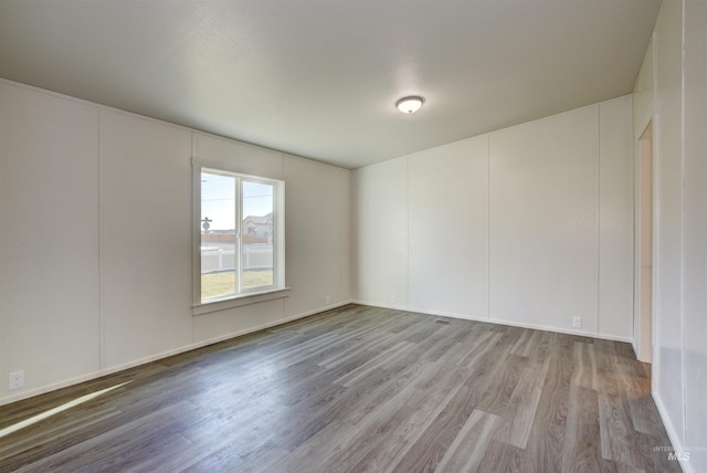 empty room featuring light wood-type flooring