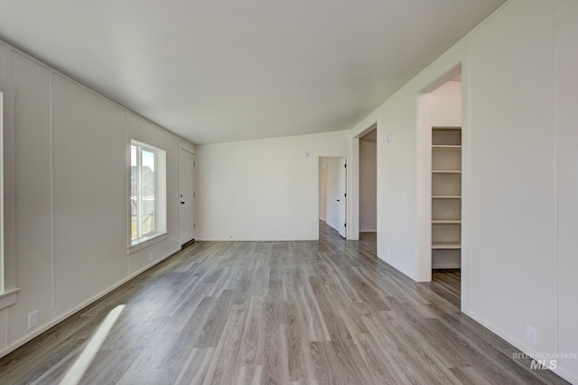 unfurnished room featuring light hardwood / wood-style flooring