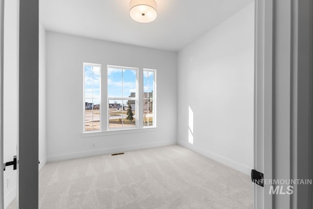 2716 N Heirloom Ave, Eagle, ID 83616 - carpeted empty room with visible vents and baseboards