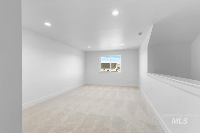 2716 N Heirloom Ave, Eagle, ID 83616 - empty room featuring recessed lighting, baseboards, and light colored carpet