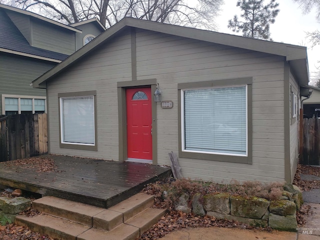 entrance to property with a wooden deck