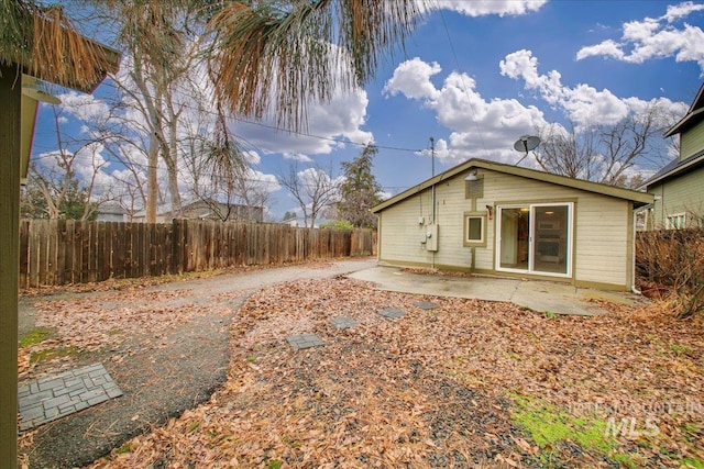 back of property featuring a patio area