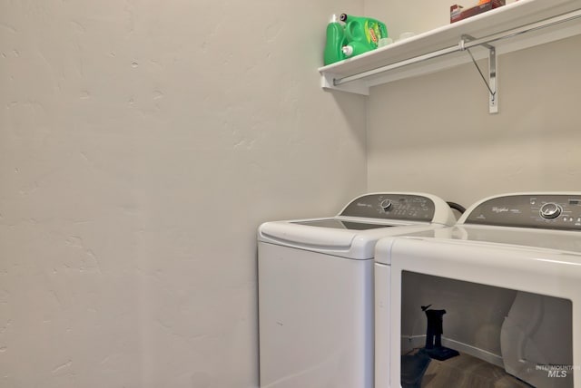 laundry room featuring washer and clothes dryer