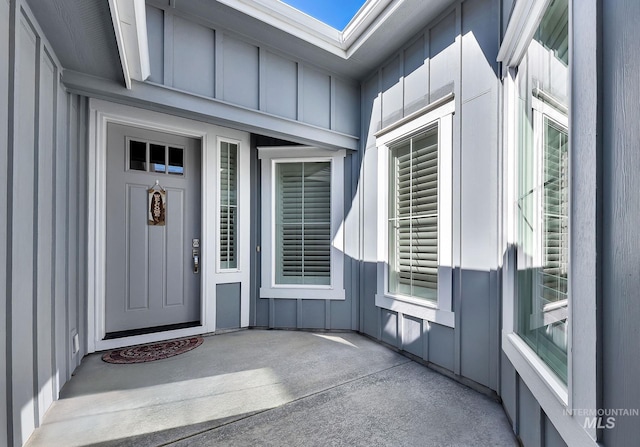 property entrance with board and batten siding