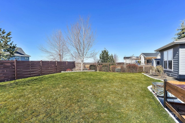 view of yard featuring a fenced backyard