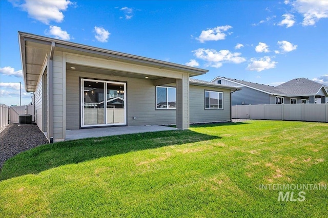17639 N El Dorado Ave, Nampa, ID 83687 - back of house with a fenced backyard and a patio area