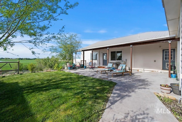 view of yard with a patio and outdoor lounge area