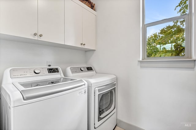 6420 W Glencrest Ln, Boise, ID 83714 - laundry room with washing machine and clothes dryer and cabinet space