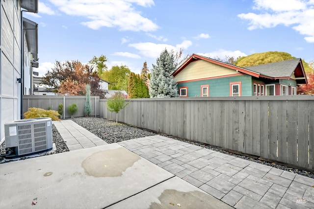 6420 W Glencrest Ln, Boise, ID 83714 - view of patio featuring a fenced backyard and central AC