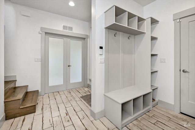 6420 W Glencrest Ln, Boise, ID 83714 - mudroom with recessed lighting, visible vents, light wood finished floors, and french doors