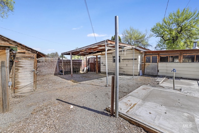 561 3rd Ave N, Twin Falls, ID 83301 - view of outbuilding featuring fence and a carport