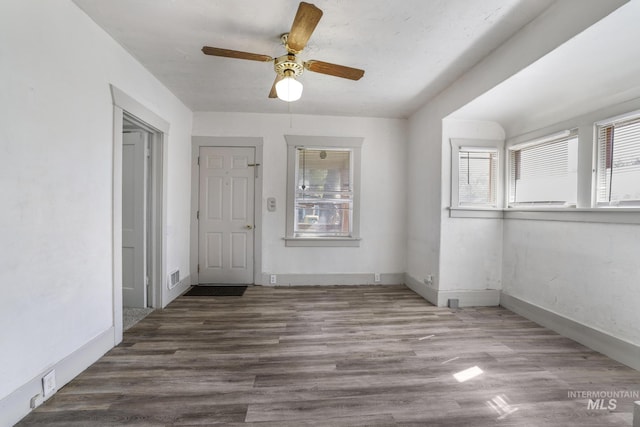 561 3rd Ave N, Twin Falls, ID 83301 - spare room featuring wood finished floors, ceiling fan, and baseboards
