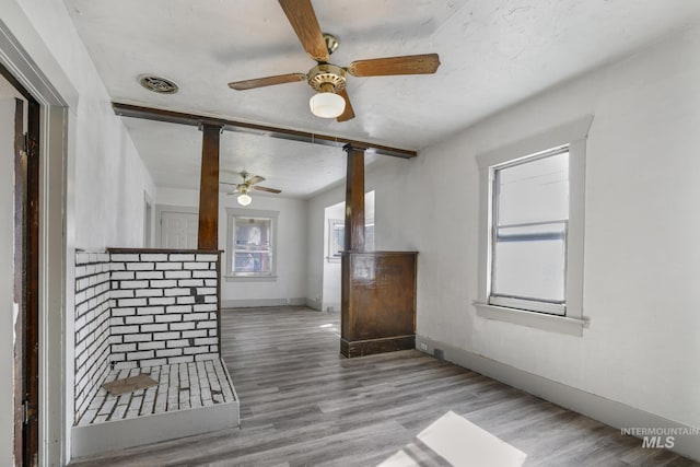 561 3rd Ave N, Twin Falls, ID 83301 - unfurnished room with ceiling fan, baseboards, and wood finished floors