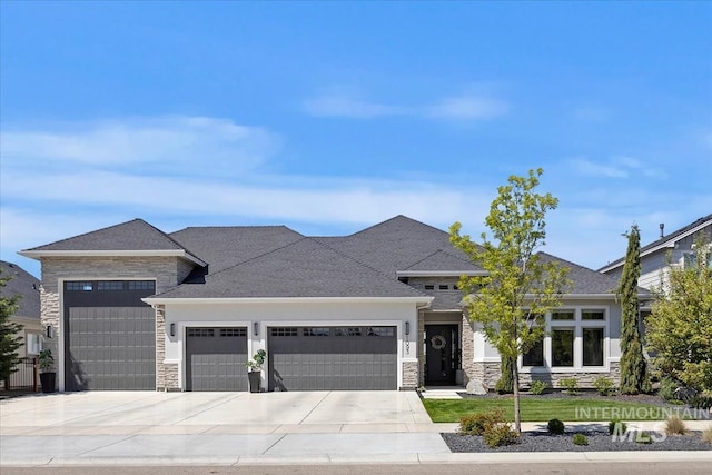 1093 N Morehouse Ave, Eagle, ID 83616 - prairie-style home featuring a garage, concrete driveway, a front yard, and stone siding