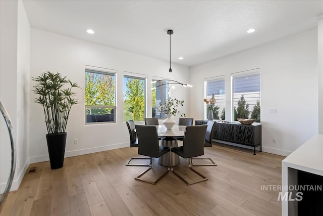 1093 N Morehouse Ave, Eagle, ID 83616 - dining space featuring recessed lighting, baseboards, light wood finished floors, and visible vents