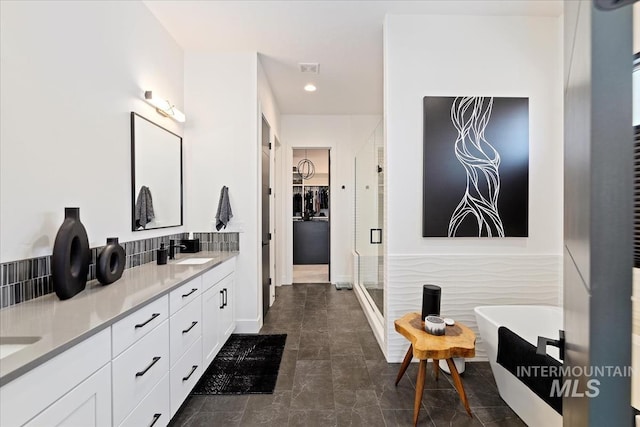 1093 N Morehouse Ave, Eagle, ID 83616 - full bath with double vanity, a freestanding bath, a shower stall, a sink, and recessed lighting