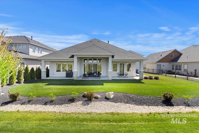 1093 N Morehouse Ave, Eagle, ID 83616 - rear view of house with fence, a lawn, a patio area, and roof with shingles