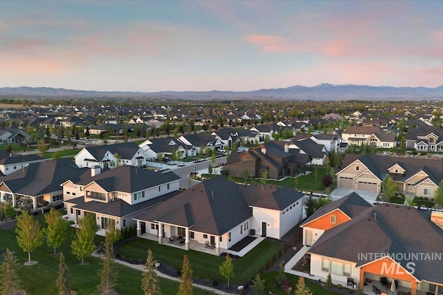 1093 N Morehouse Ave, Eagle, ID 83616 - aerial view at dusk featuring a residential view and a mountain view