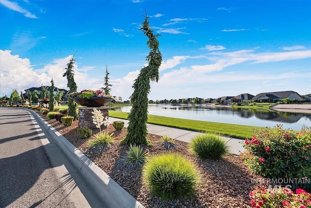 1093 N Morehouse Ave, Eagle, ID 83616 - exterior space featuring a lawn, a water view, and a residential view