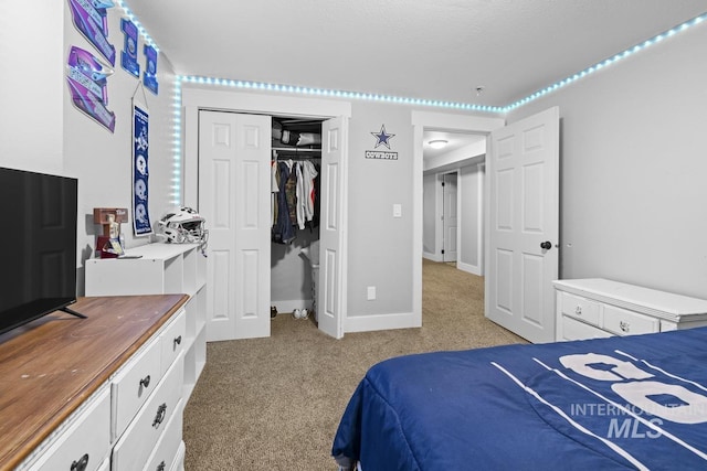 bedroom with light carpet and a closet