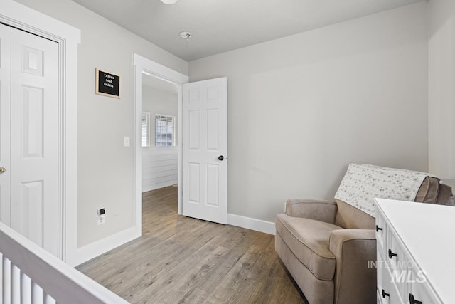 living area featuring light hardwood / wood-style floors