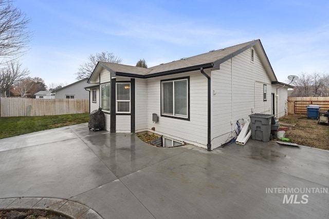 back of house with a patio area