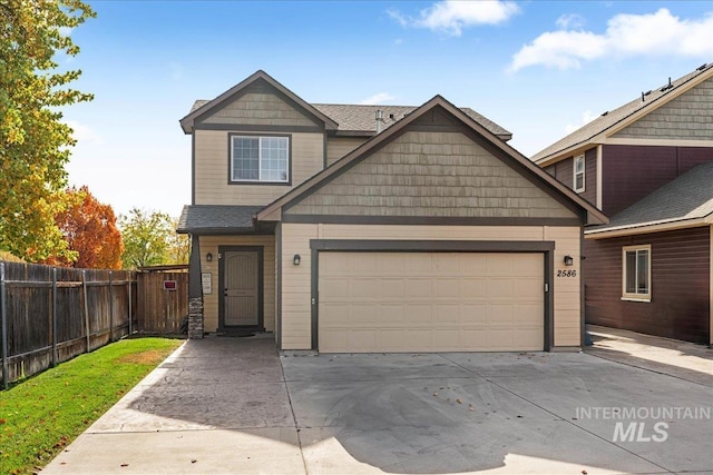 craftsman-style home with a garage