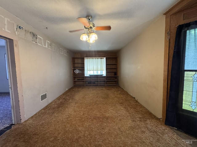 104 E B St, Shoshone, ID 83352 - unfurnished room with carpet and ceiling fan