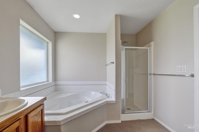 1460 N Pointe Dr, Twin Falls, ID 83301 - full bathroom featuring a shower stall, a bath, and vanity