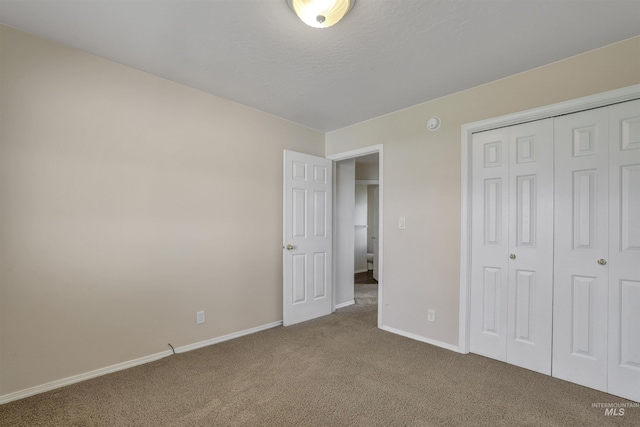 1460 N Pointe Dr, Twin Falls, ID 83301 - unfurnished bedroom featuring carpet floors and a closet