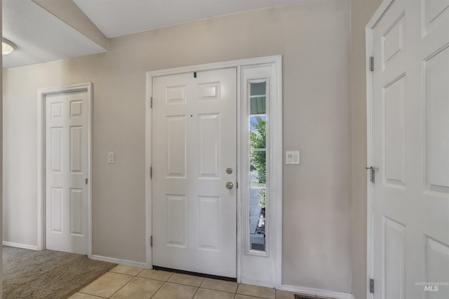 1460 N Pointe Dr, Twin Falls, ID 83301 - entryway with baseboards and light tile patterned flooring