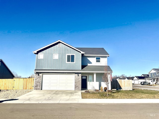 view of front of property with a garage