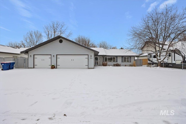 ranch-style house featuring a garage