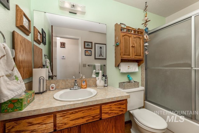 392 S Sun Burst Way, Boise, ID 83709 - full bath with vanity, shower / bath combination with glass door, and toilet