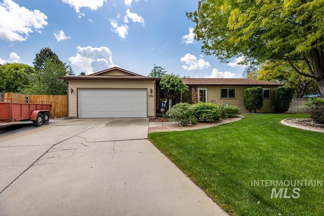 392 S Sun Burst Way, Boise, ID 83709 - ranch-style house with concrete driveway and an attached garage