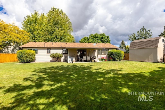 392 S Sun Burst Way, Boise, ID 83709 - back of property with a patio area