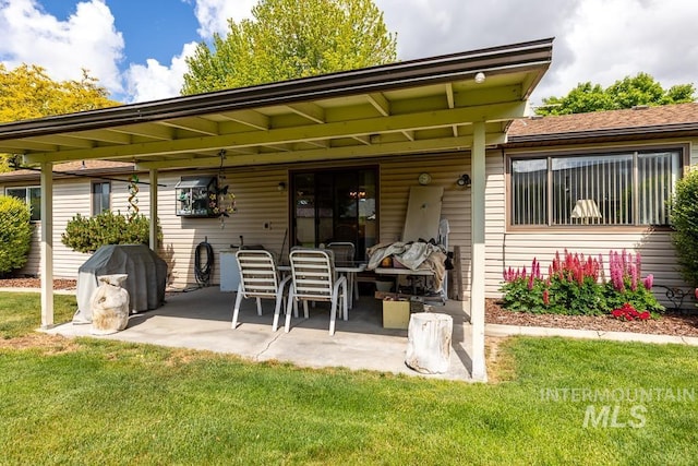 392 S Sun Burst Way, Boise, ID 83709 - back of property with a yard and a patio