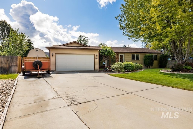 392 S Sun Burst Way, Boise, ID 83709 - ranch-style house with driveway and a garage