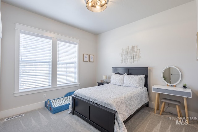 bedroom featuring carpet