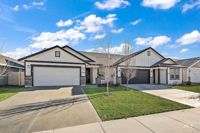 ranch-style home featuring a garage and a front lawn