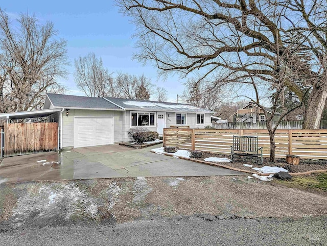 single story home with a garage and a carport