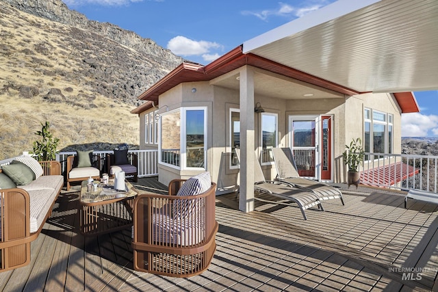 deck with a mountain view