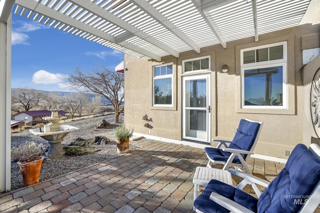 view of patio / terrace featuring a pergola