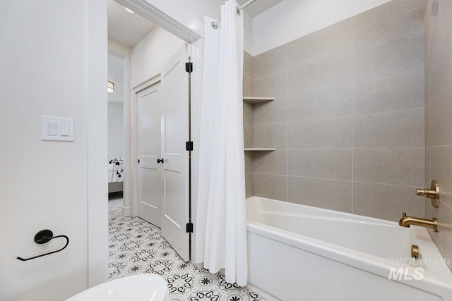 bathroom with tile patterned floors and shower / bathtub combination with curtain