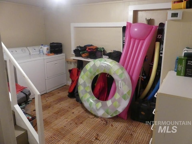 clothes washing area featuring laundry area and independent washer and dryer