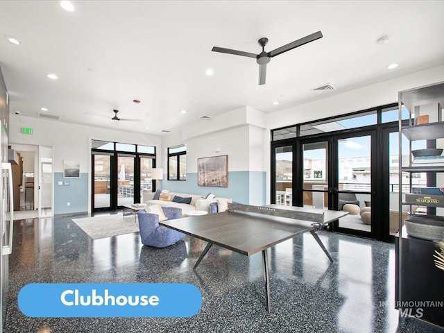 interior space with ceiling fan and french doors