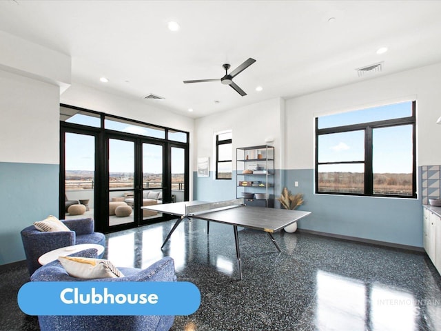 rec room with ceiling fan and french doors