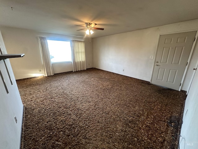 unfurnished room with carpet floors and ceiling fan