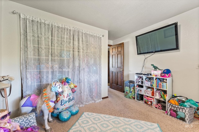 playroom featuring carpet floors