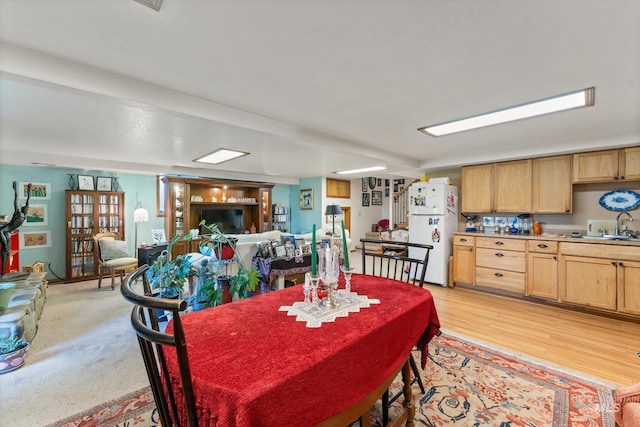 dining room featuring light wood-type flooring